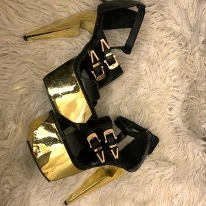 Tall black and gold heels